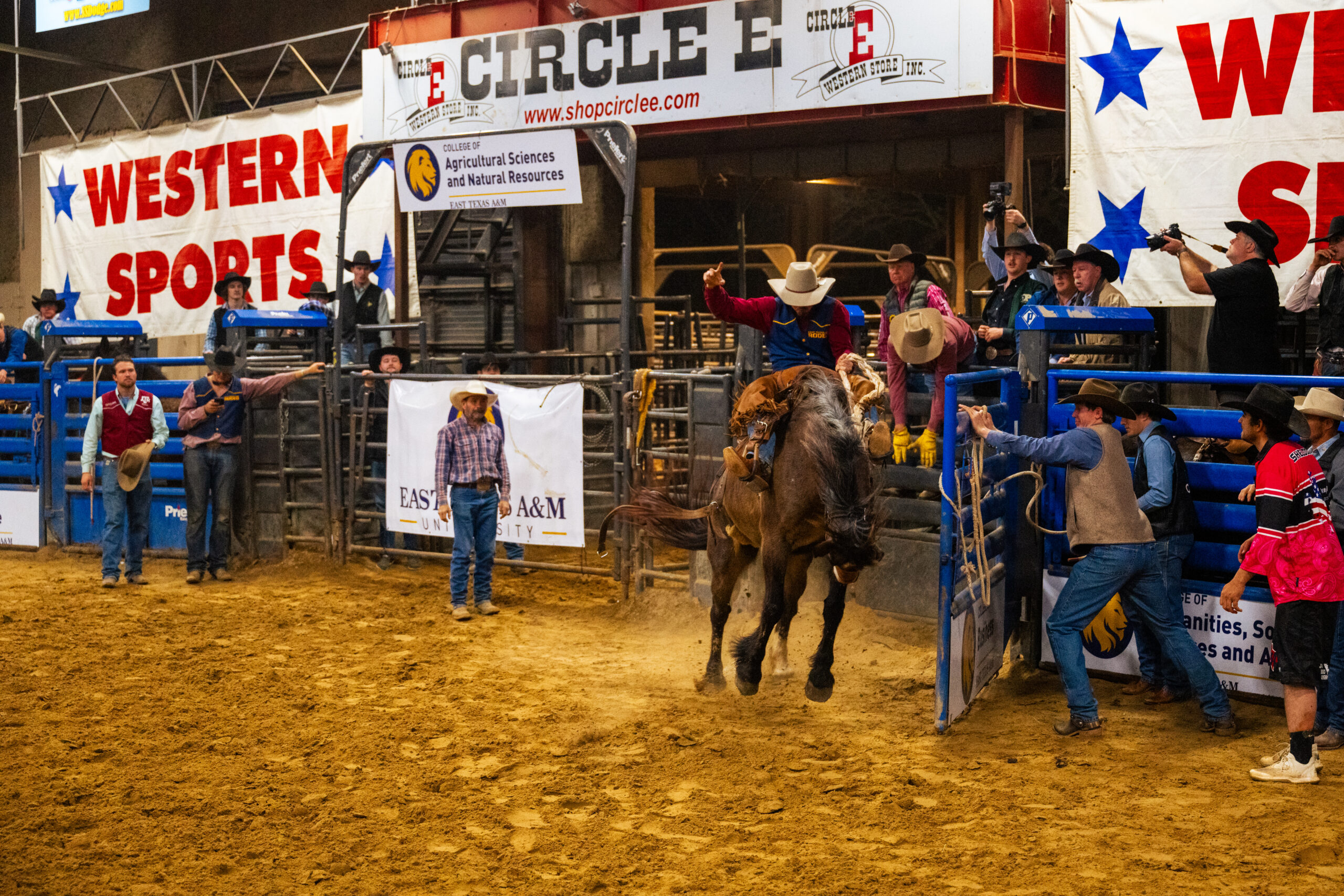 Cowboy riding a horse at the rodeo