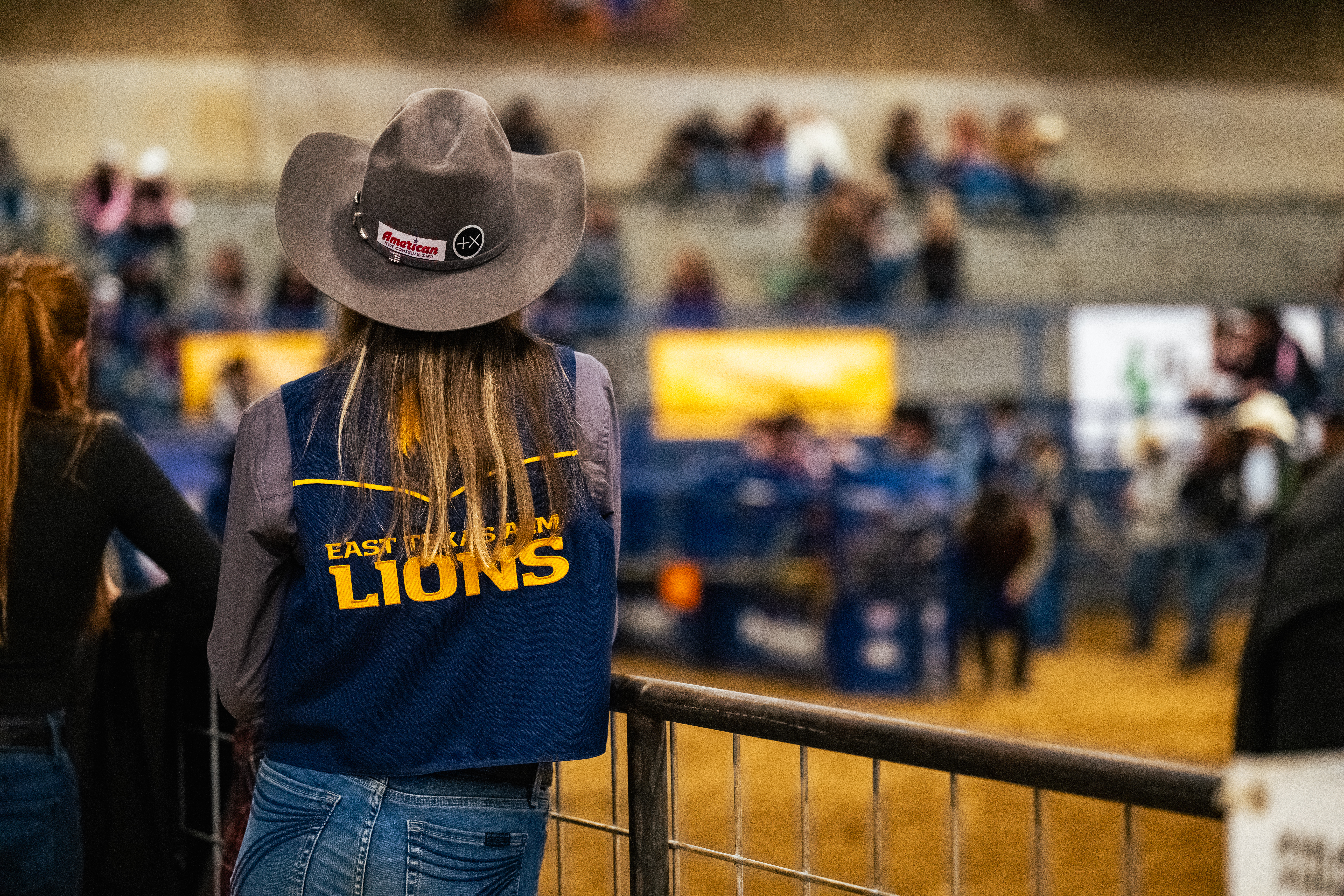 Cowgirl Watching Rodeo at The Spur Expo
